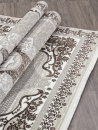 Турецкий прямоугольный ковёр Q010A BROWN FDY/CREAM SHRINK